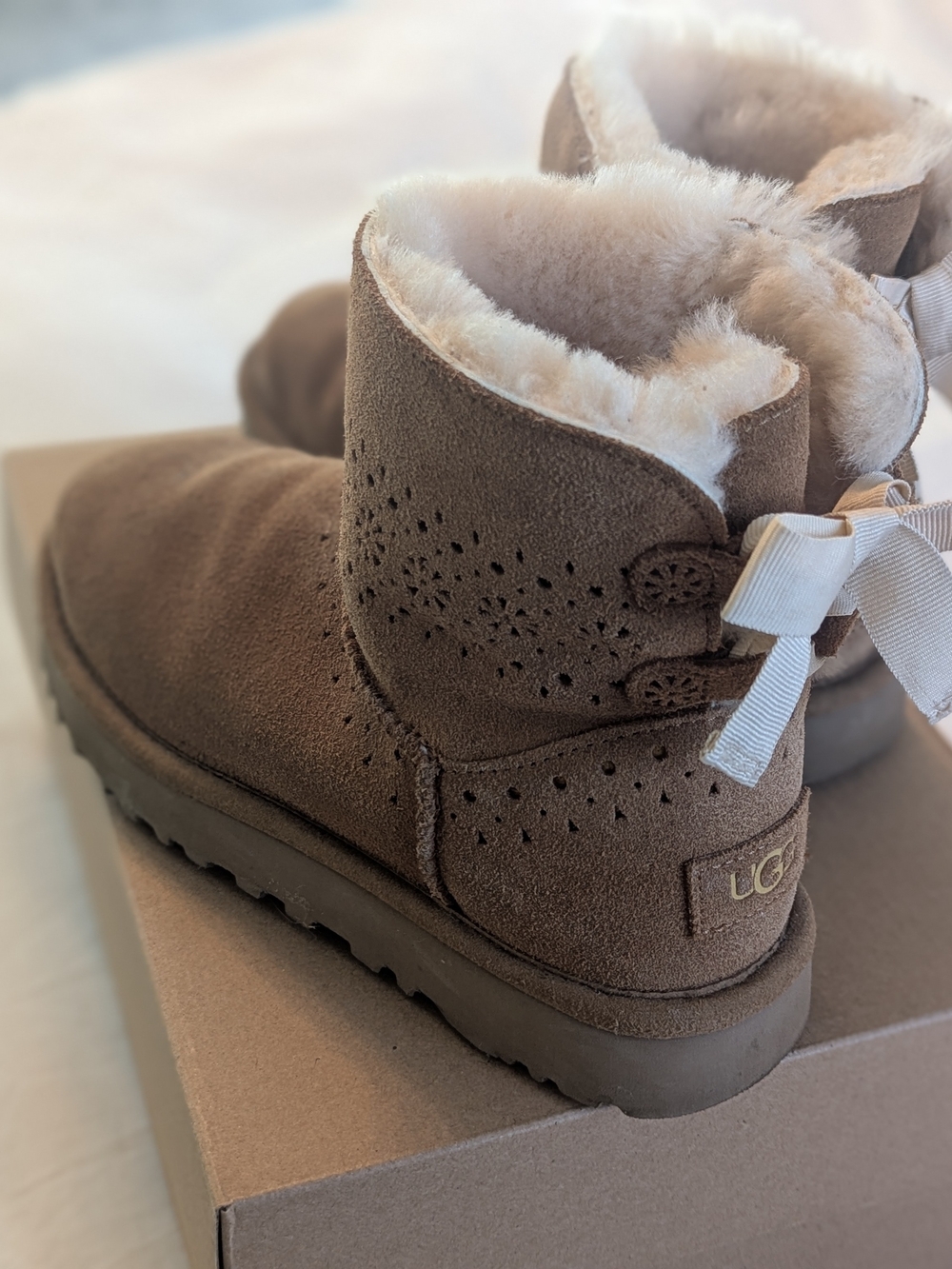 UGG Mini Suede Shearling Booties in Chestnut with Ribbon Detail